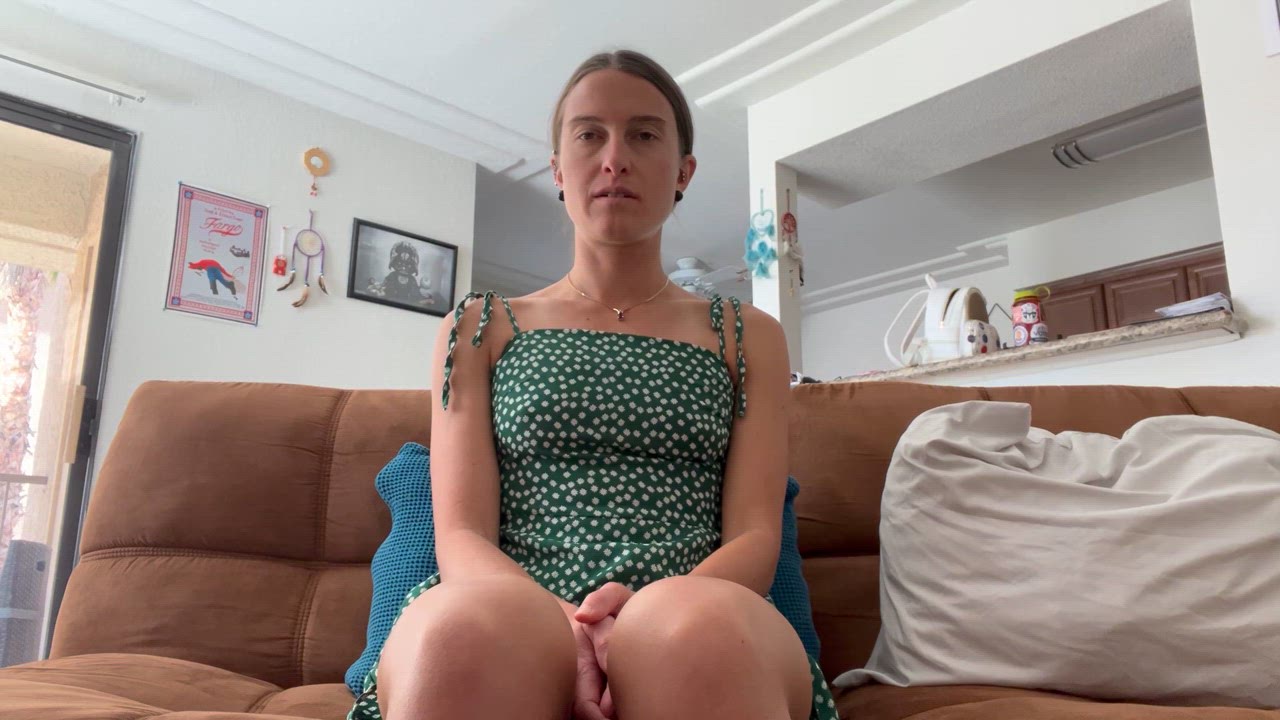 0:42 thumbnail from "robot_trigger.mov". Nicole sits on a brown couch as the deep hypnotic trance induction begins.